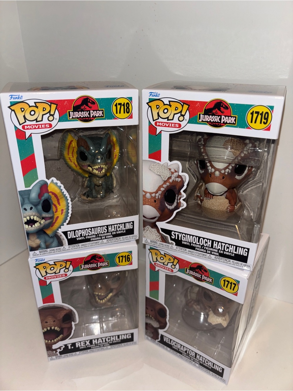 Funko Jurassic Park Hatchling 4-Pack Vinyl Figures - Green, Brown, Tan, Gray